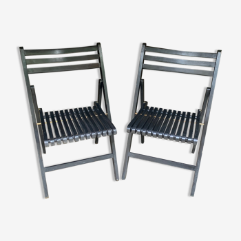 Pair of black folding chairs