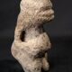 Anthropomorphic figure in volcanic stone, Oceanic tribal art, 17th century