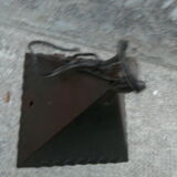 pair of wrought iron lanterns and granite glass