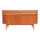 1950s cherry wood sideboard with sliding doors.