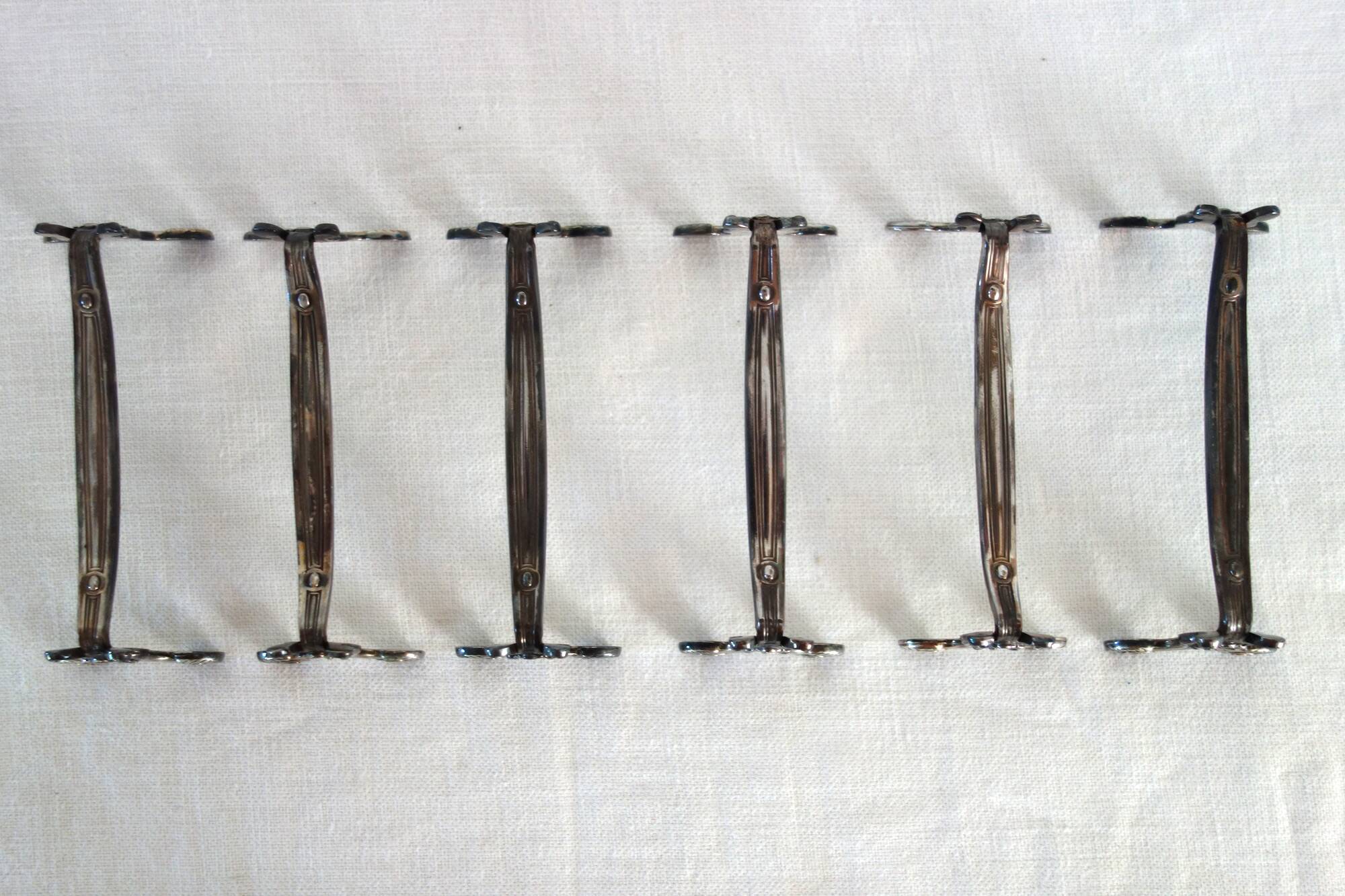 6 porte-couteaux en métal argenté Christofle