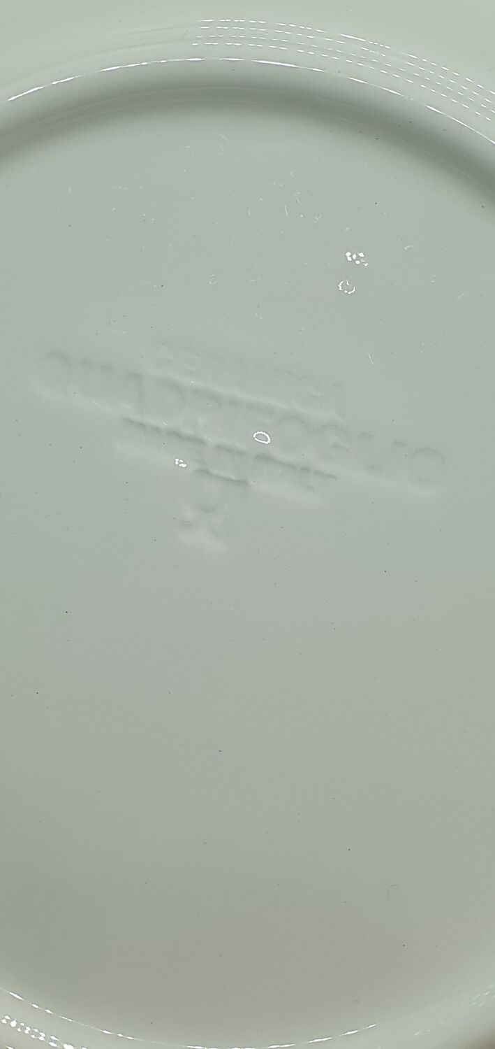 8 white ceramic plates