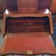 Brown mahogany secretary desk with marquetry