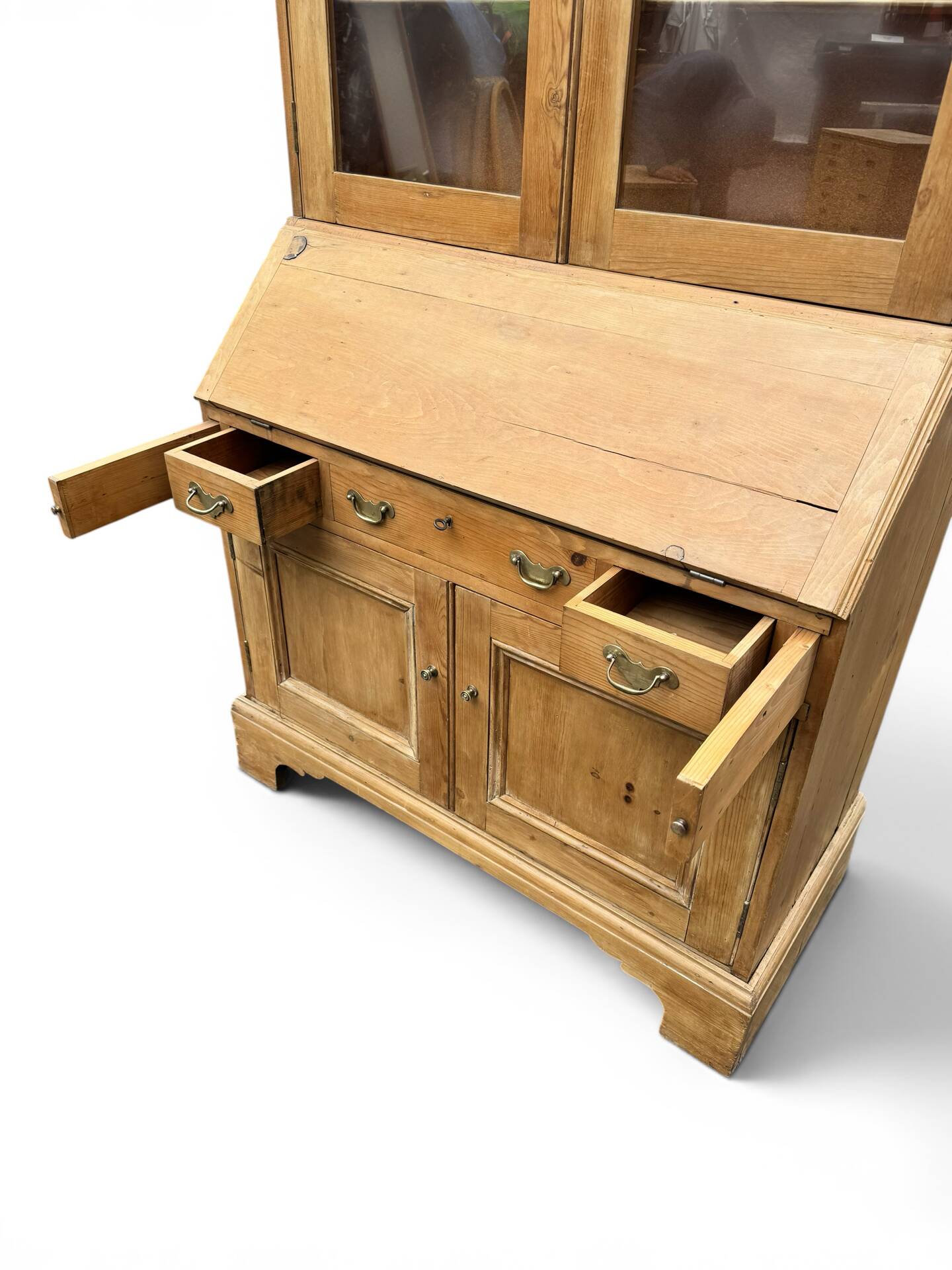Showcase secretary with two bodies, English, in raw pine – around 1900