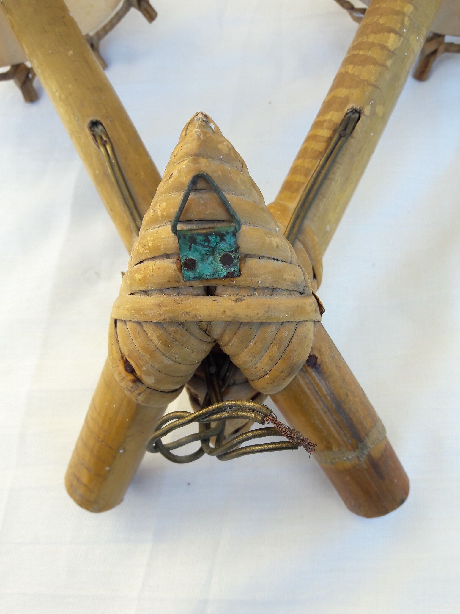 Double rattan sconce