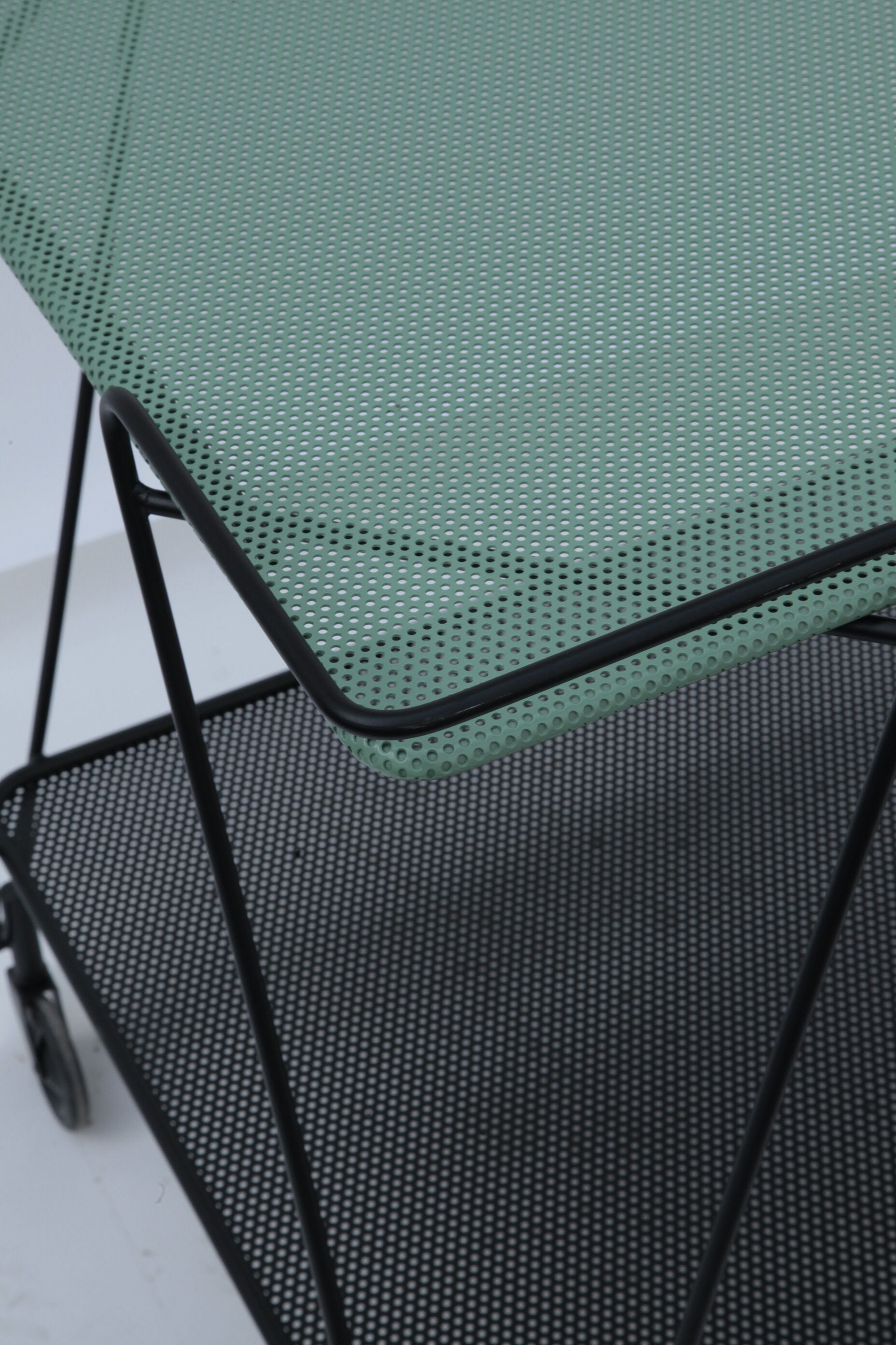 Perforated metal rolling table