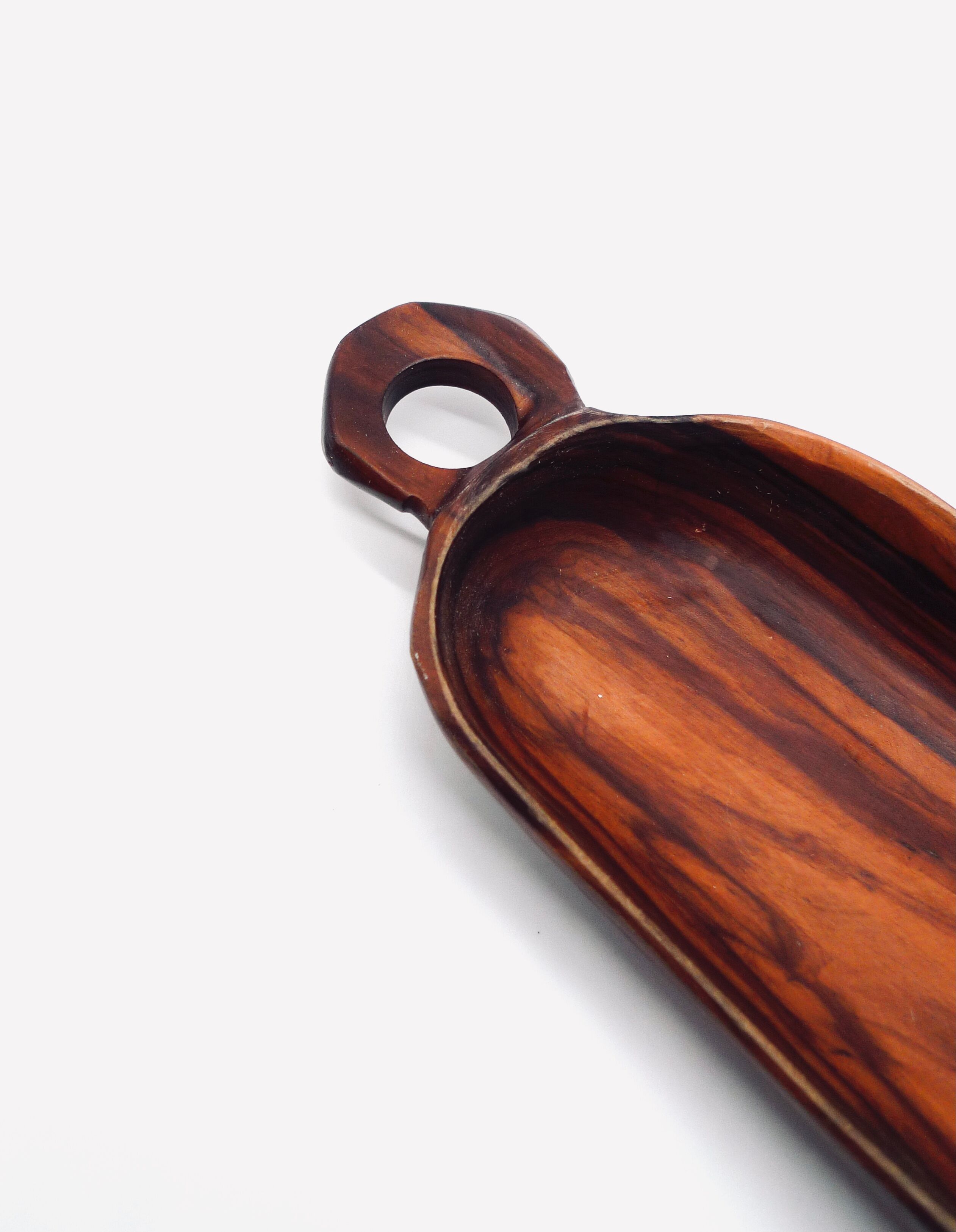 Empty pocket in olive wood