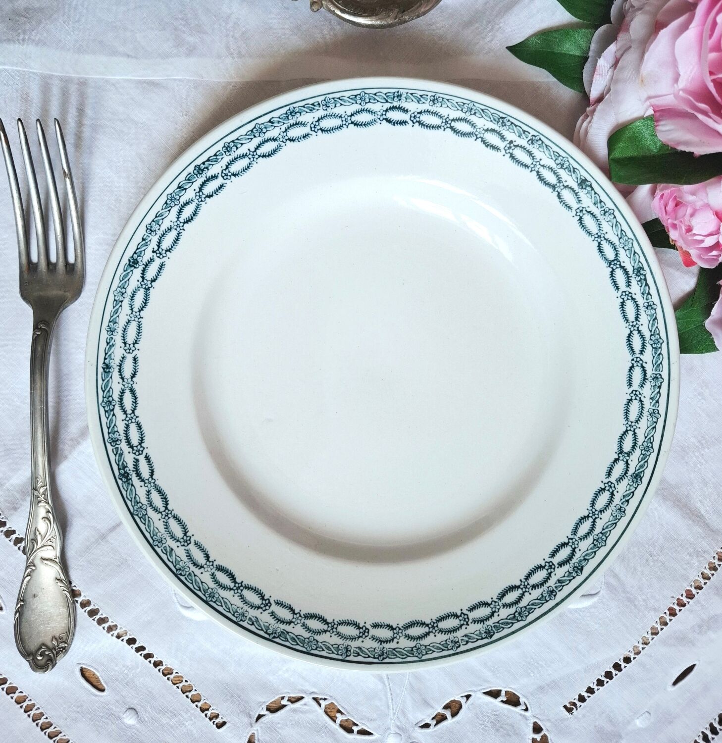 Mismatched antique flat plates made of ironstone accompanied by
