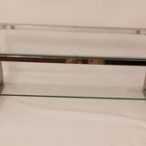 1980s coffee table with a double chrome metal top.