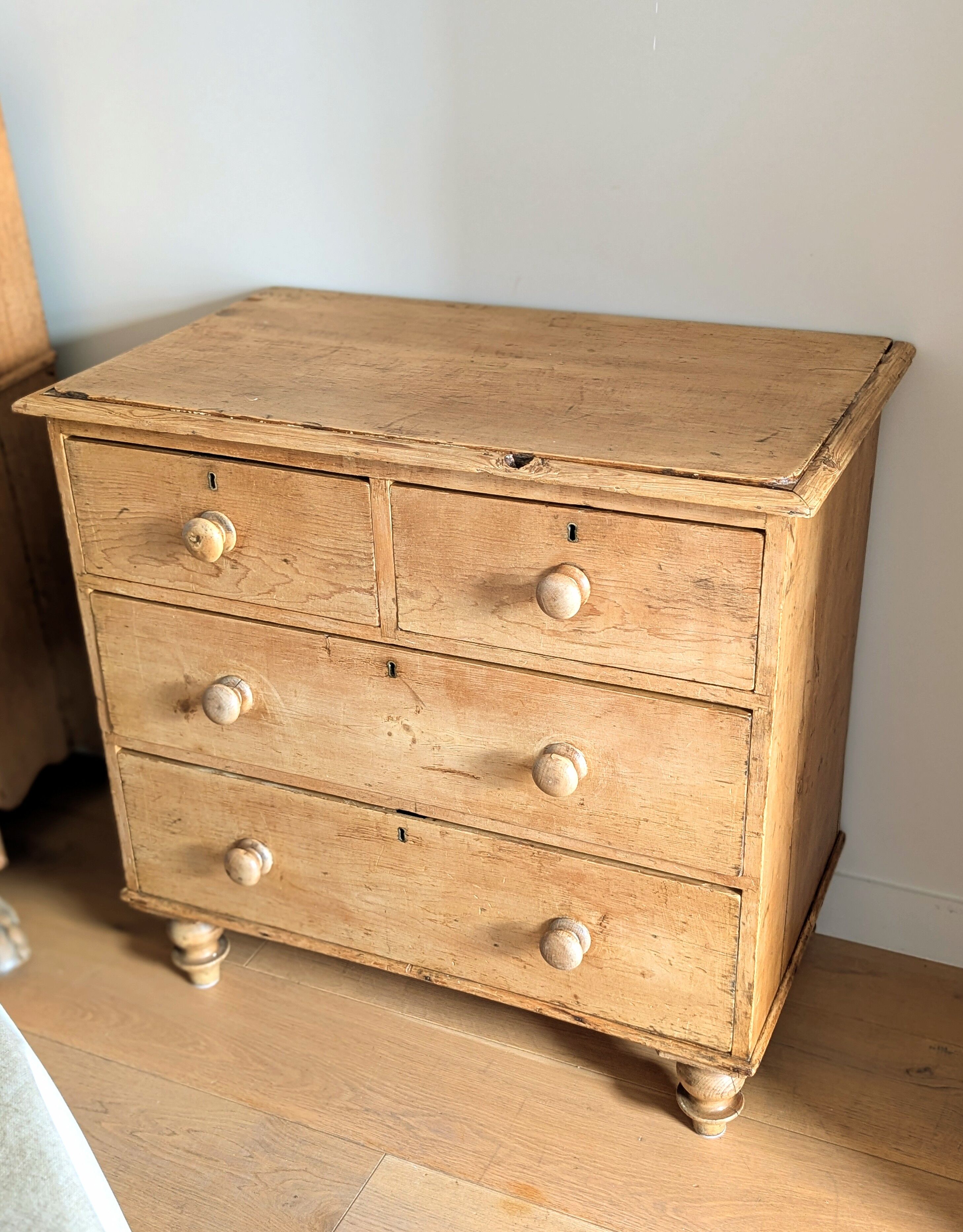 Renovated antique English solid pine chest of drawers.