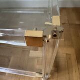 2 side tables in plexiglass, glass, and brass.