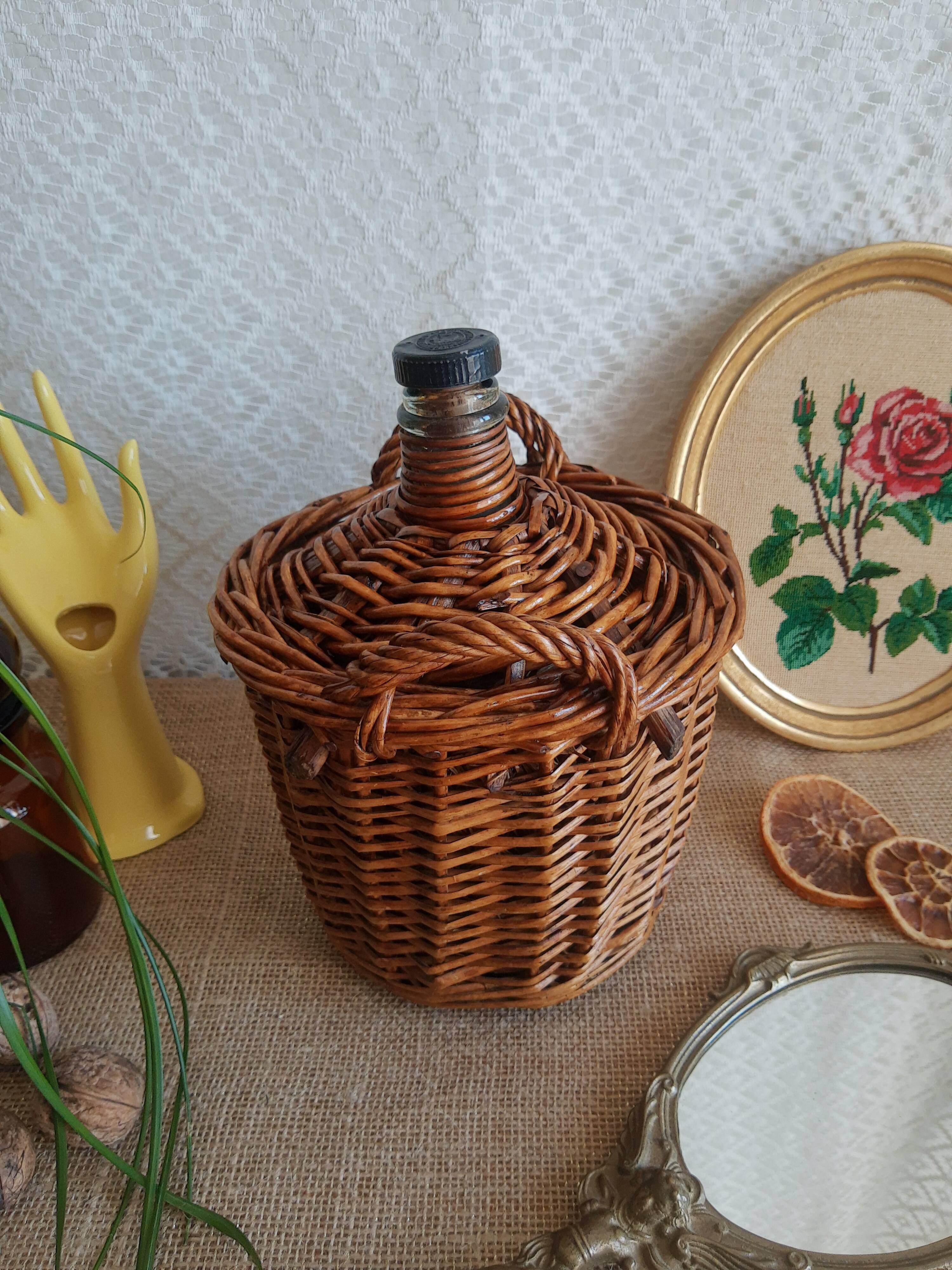 Small canister demijohn in glass circled with wicker - vintage