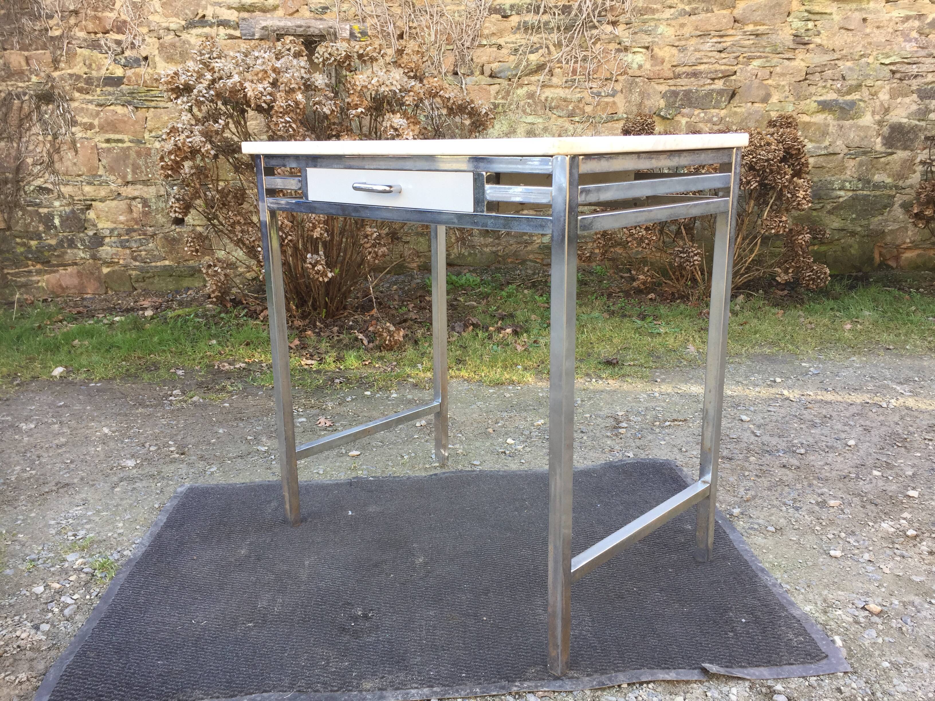 Vintage table with square chrome tubular metal base and marble top.