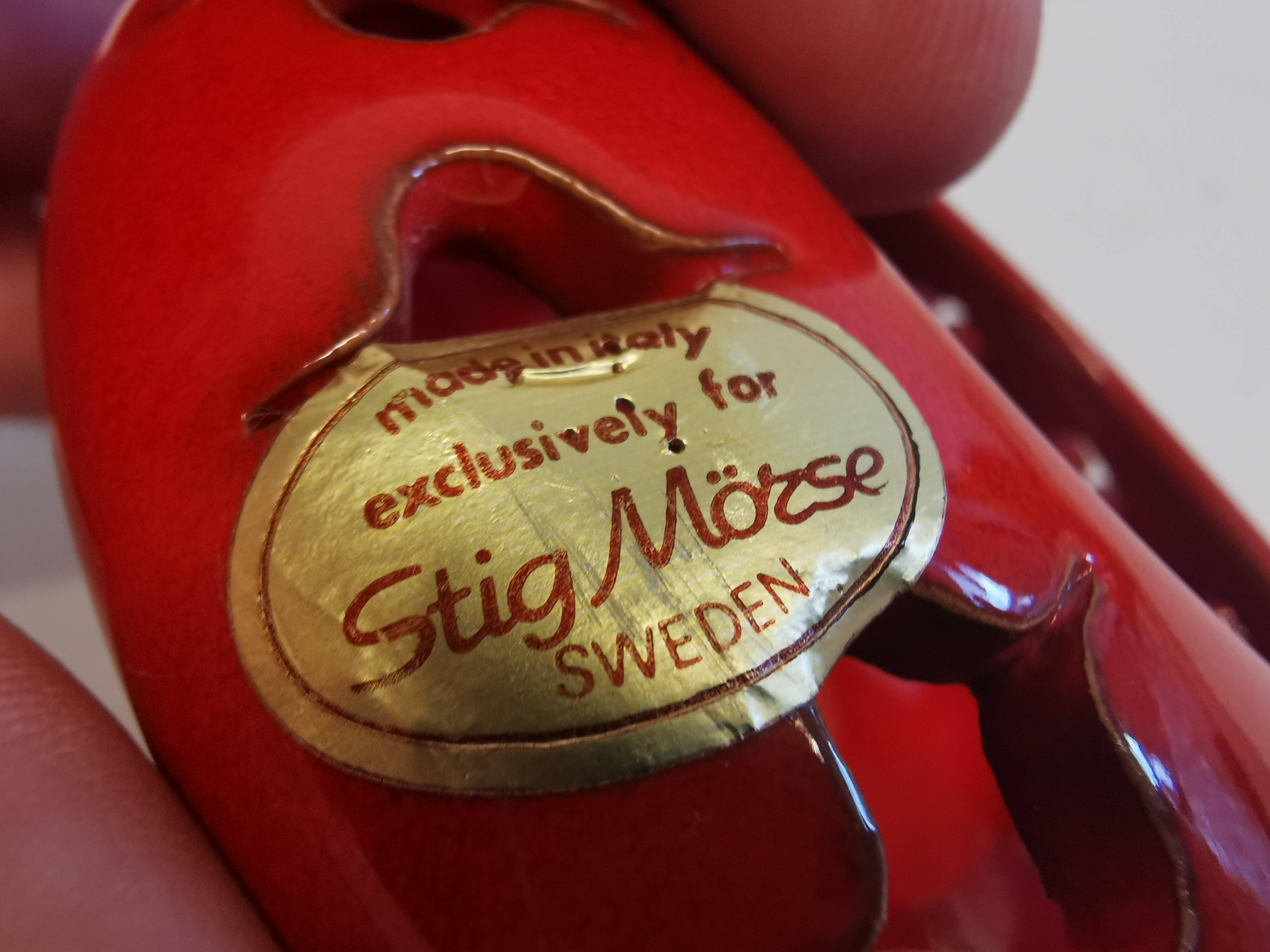 Pair of candle holders from the 1960s-1970s, crafted in red ceramic