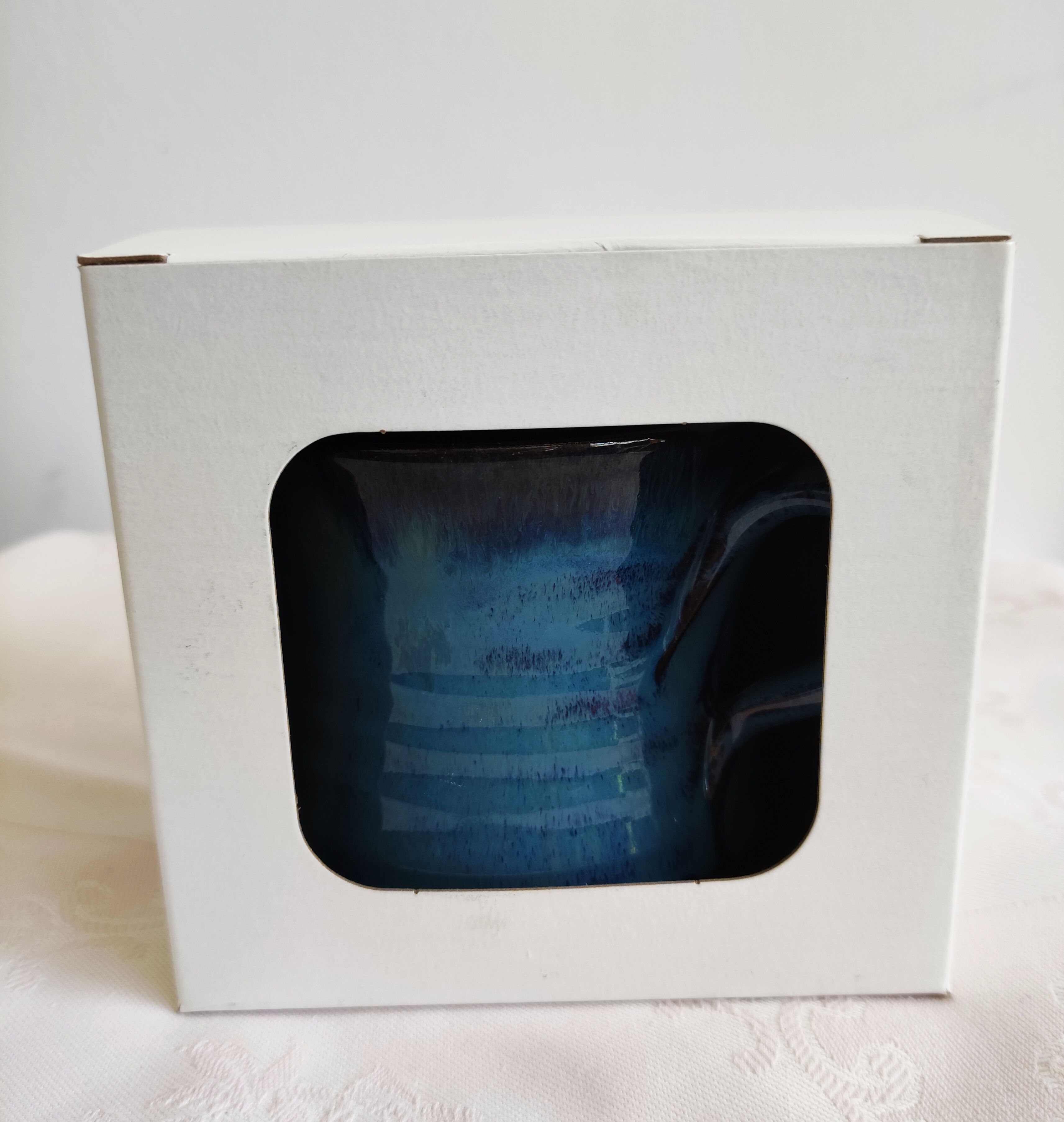 Blue enamelled terracotta mug