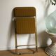 Vintage folding chair lafuma chantazur with striped gold fabric