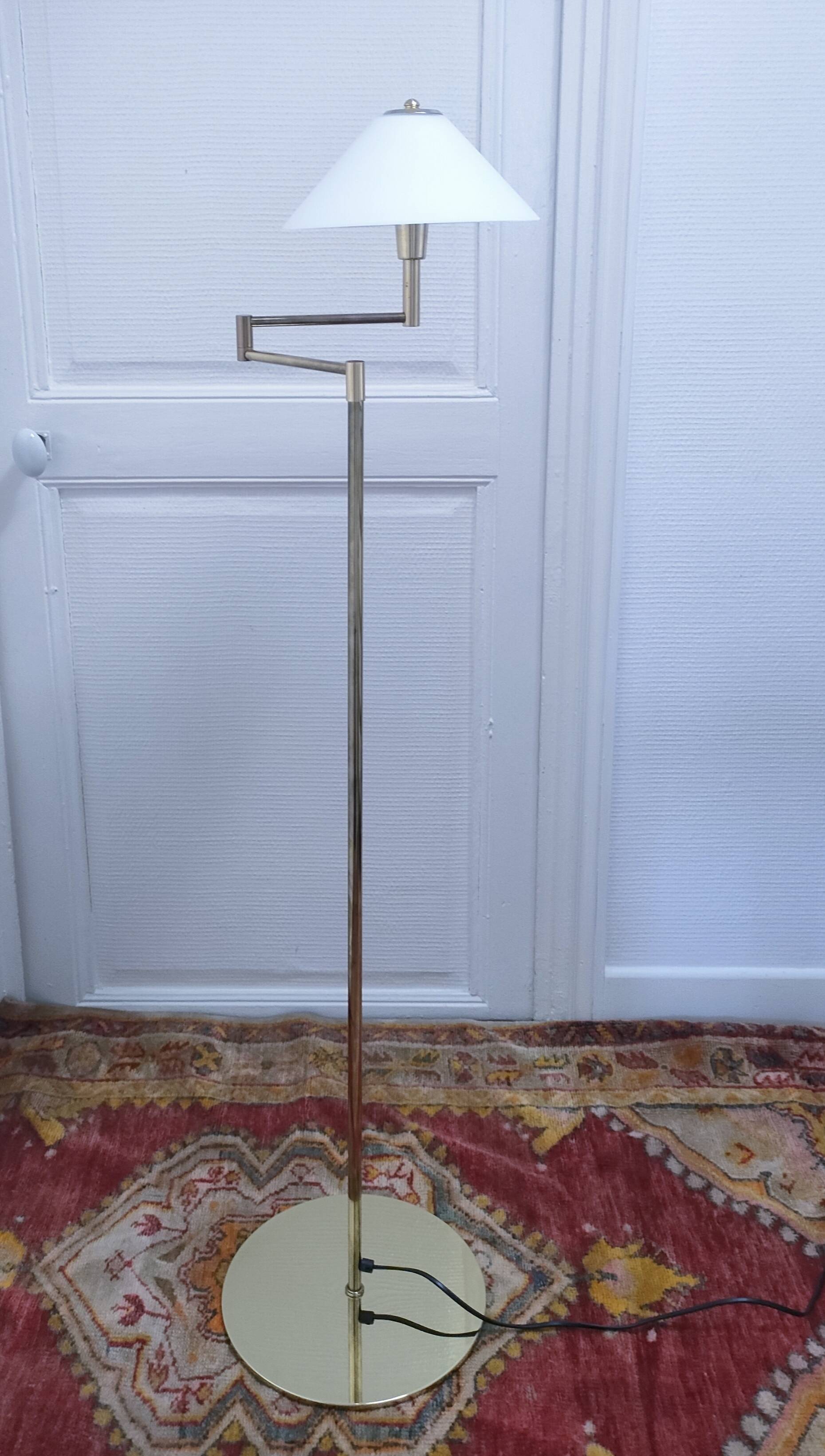 Articulated reading floor lamp in gold metal from the 90s