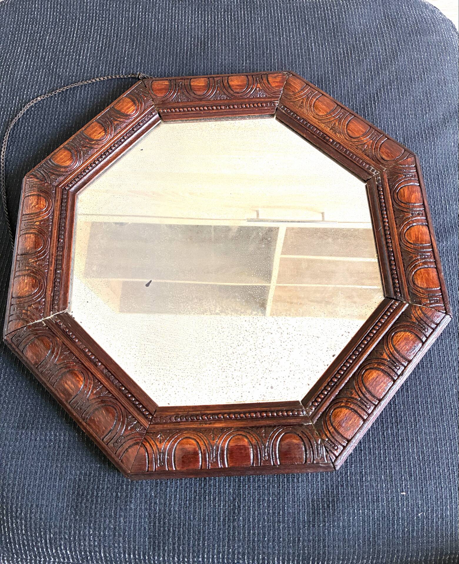 Octagonal mirror, glossy varnished oak, Art Deco.
