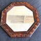 Octagonal mirror, glossy varnished oak, Art Deco.