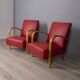 Pair of vintage 1950's armchairs in red leather, italian design
