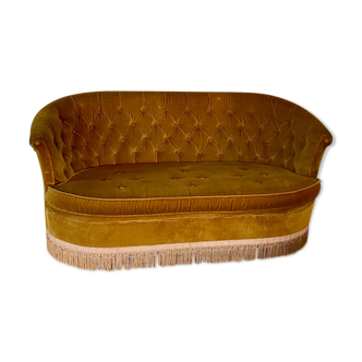 Old gold toad bench