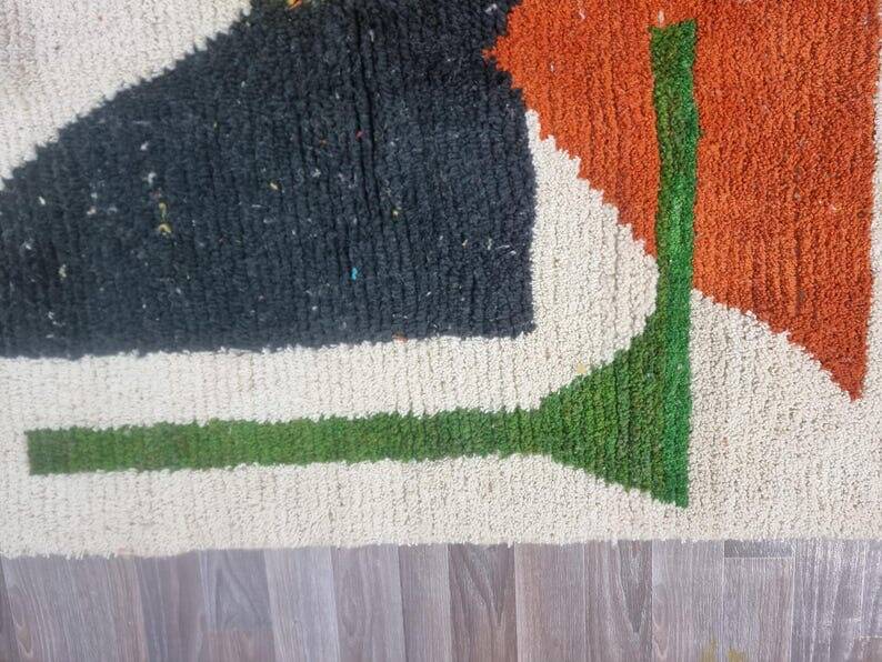 Handmade traditional Moroccan rug with colourful patterns, size 140x260 cm.