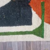 Handmade traditional Moroccan rug with colourful patterns, size 140x260 cm.