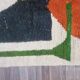Handmade traditional Moroccan rug with colourful patterns, size 140x260 cm.
