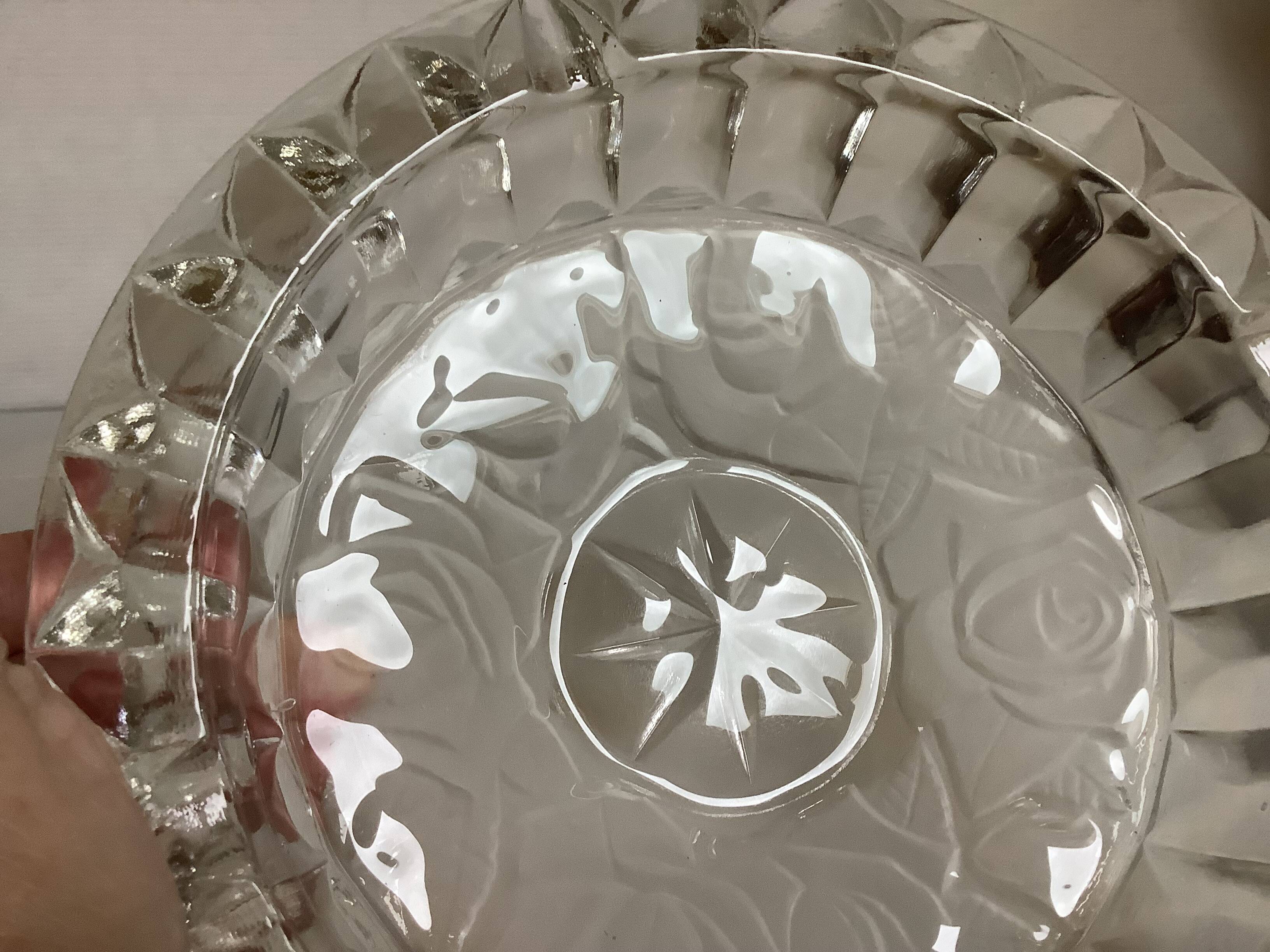 Large glass ashtray with frosted flowers.