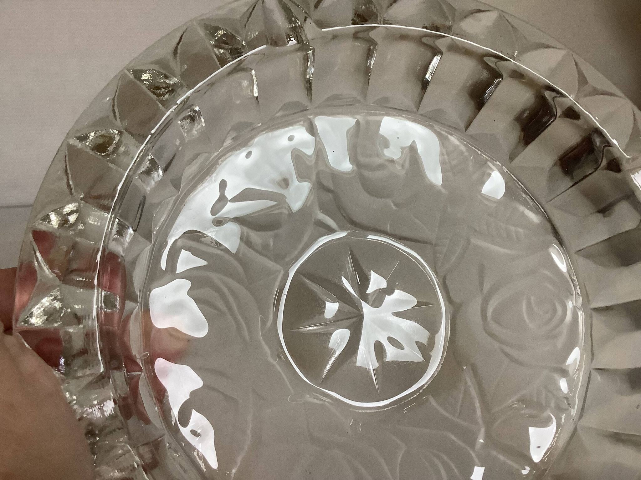 Large glass ashtray with frosted flowers.