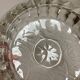 Large glass ashtray with frosted flowers.