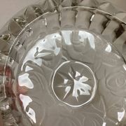 Large glass ashtray with frosted flowers.