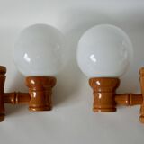 Pair of globe wall lights in pine and opaline from the 60s