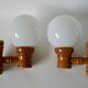 Pair of globe wall lights in pine and opaline from the 60s