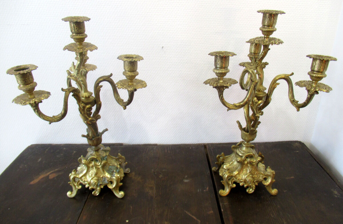 Pair of bronze candelabras and brass bobèches