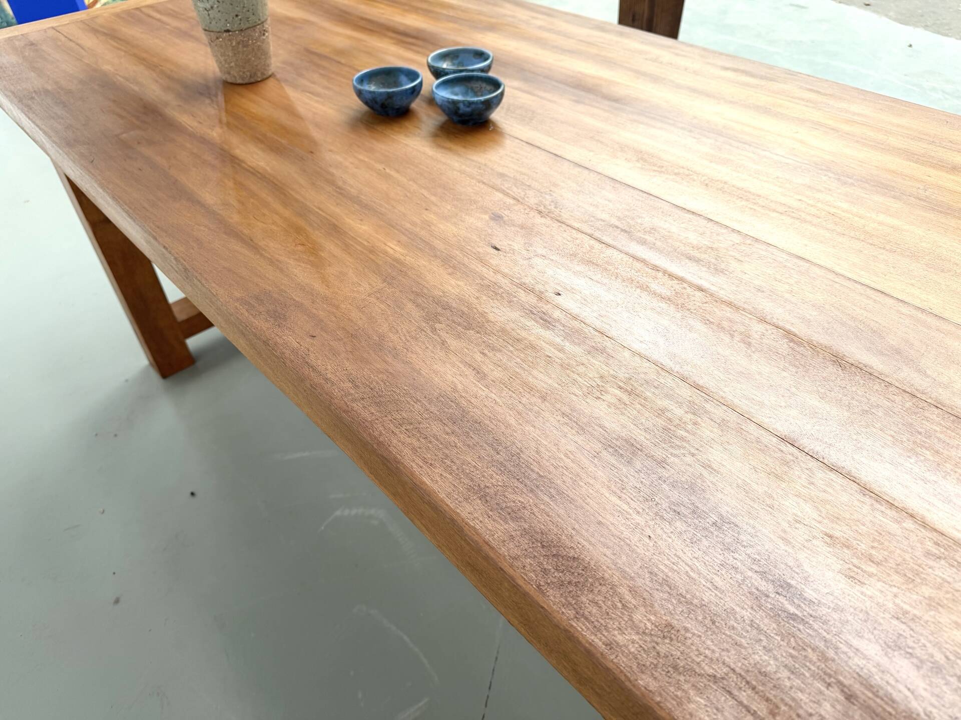Large modernist farmhouse table in solid beech, thick dowelled top.