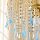 Vintage chandelier with blue Murano glass pendants.