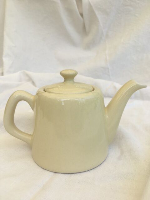 "Selfish" cream-colored teapot