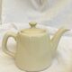 "Selfish" cream-colored teapot