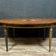 Louis XVI table has extensions in precious wood marquèterie