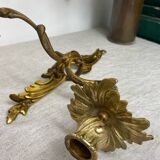 Two Louis XV style bronze wall candlesticks