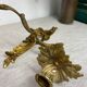 Two Louis XV style bronze wall candlesticks