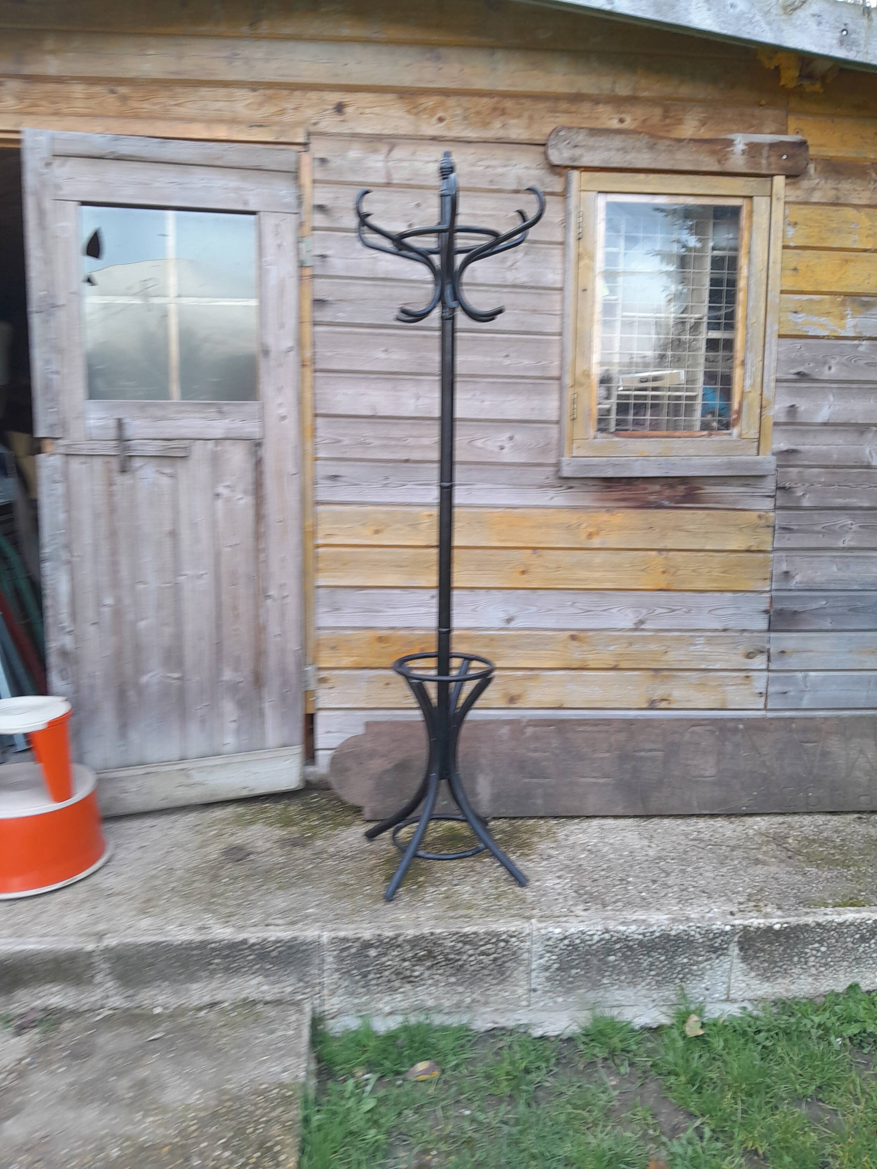 Vintage parrot coat rack in old wood