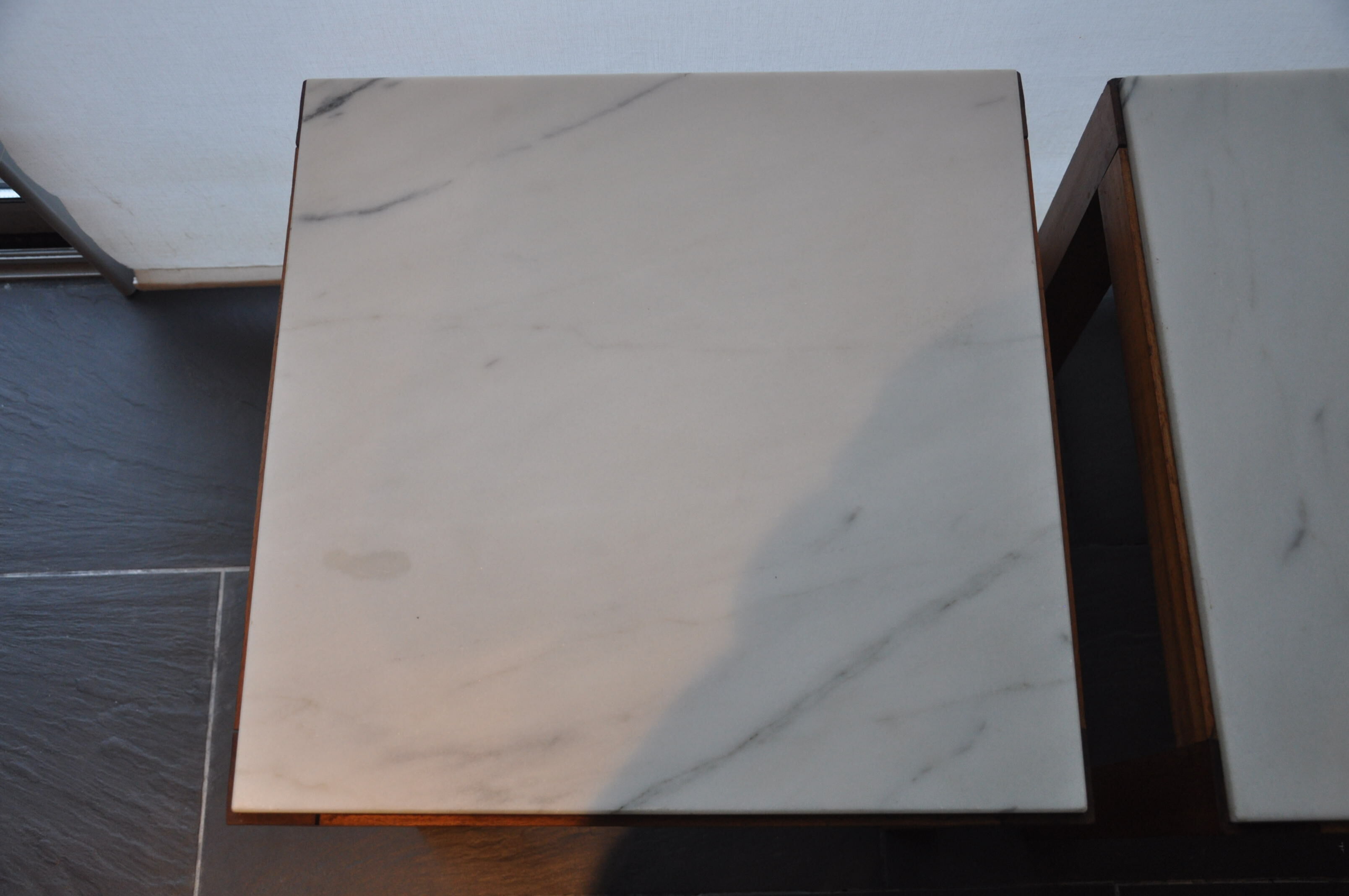 Pair of wooden and marble side tables