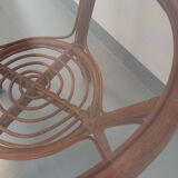 Vintage round smoked glass and rattan coffee table from the 70s