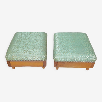 Pair of wooden footrests and green silk
