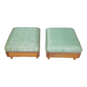 Pair of wooden footrests and green silk