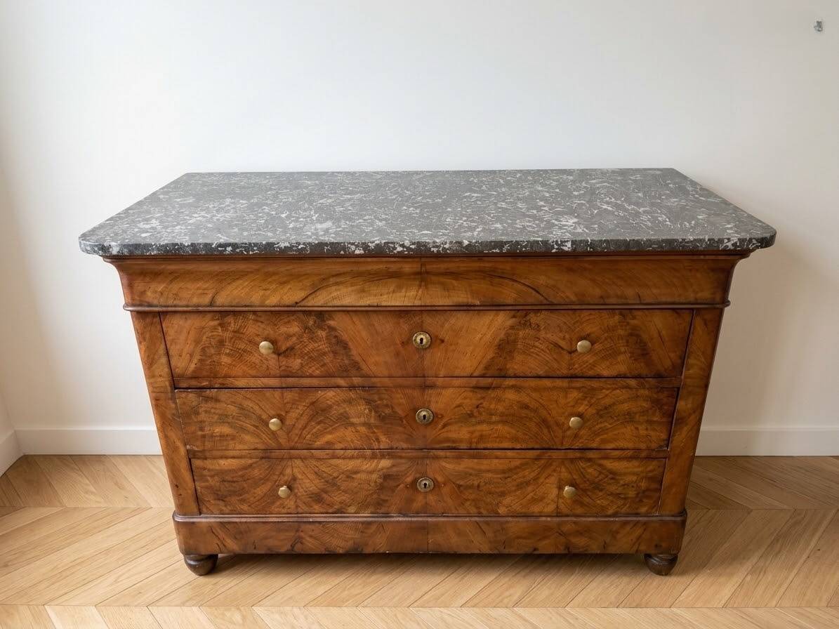 Antique walnut commode with a grey marble top.