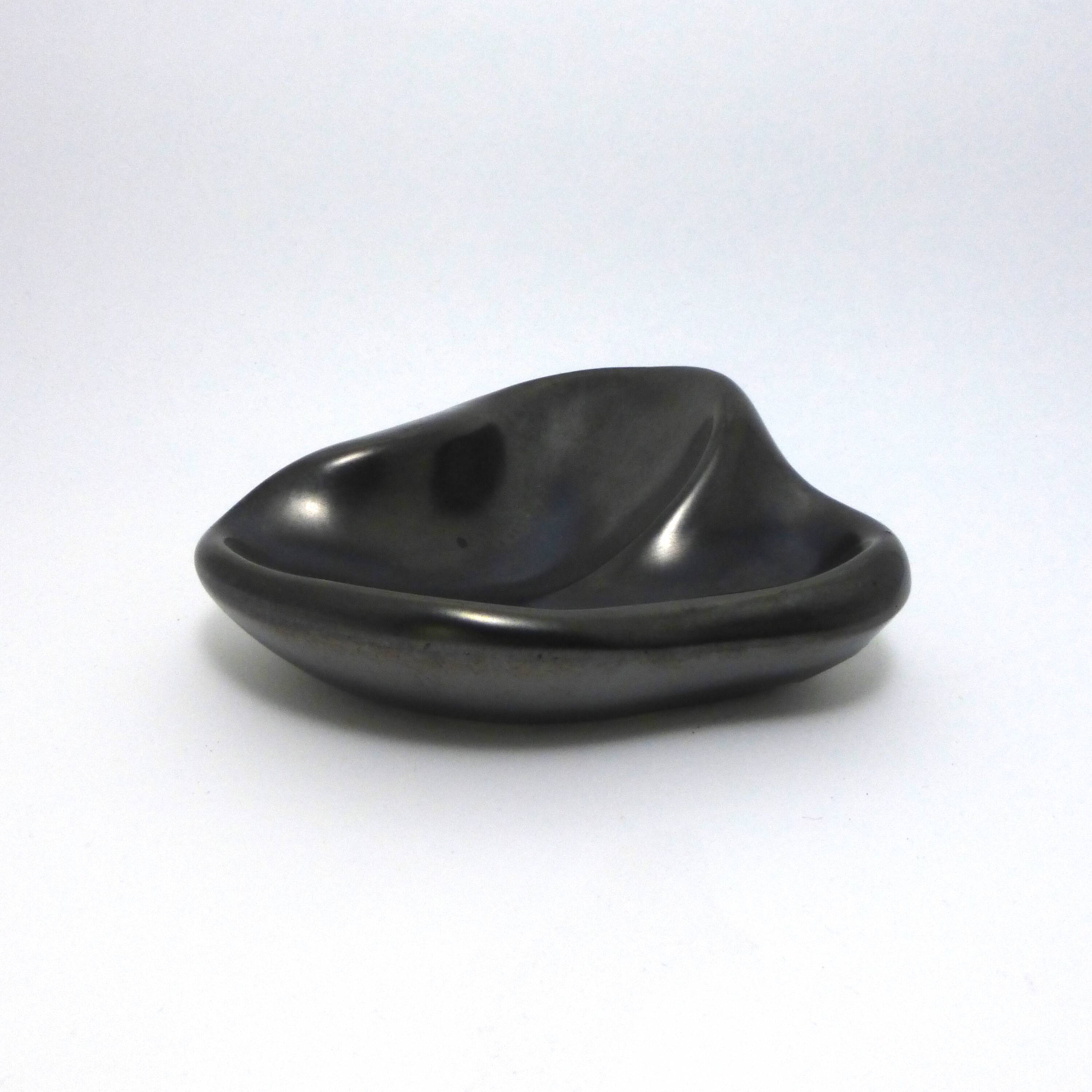 Ashtray in metallic black ceramic around 1950