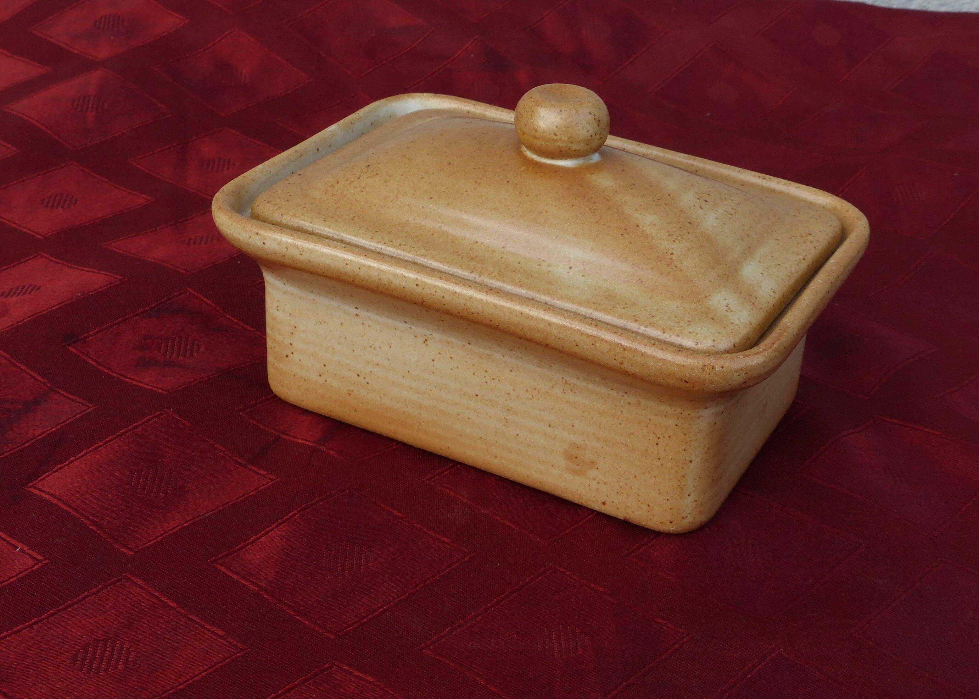 Butter maker in "sandstone village france"